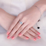 Classic-Halo-Blue-Topaz-Ring-display