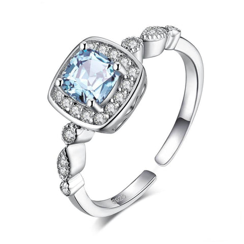 Classic-Halo-Blue-Topaz-Ring