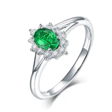 Oval-Floral-Halo-Emerald-Engagement-Ring-1