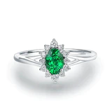 Oval-Floral-Halo-Emerald-Engagement-Ring